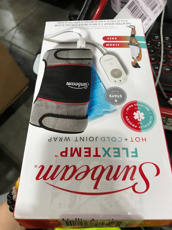 Photo 1 of Sunbeam Heating Pad Wrap for Joint Pain Relief with Frozen Pack Auto Shut Off and Moist Heating Option Black/Grey
