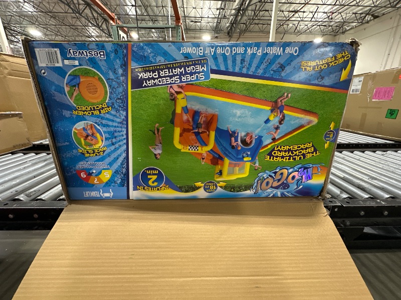 Photo 1 of Bestway H2OGO! 18 x 16.5 x 8.7 Foot Super Double Racing Super Speedway Kids Inflatable Water Park with Air Blower, Ground Stakes, and Storage Bag
