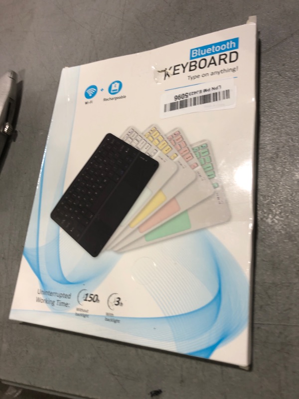 Photo 1 of Wireless Keyboard with Touchpad, Ultra-Thin Rechargeable Bluetooth Keyboard Mini Wireless Keyboard with trackpad Round Key for iPad pro/iPad/iOS/Mac OS/Windows/Android (Light Blue)