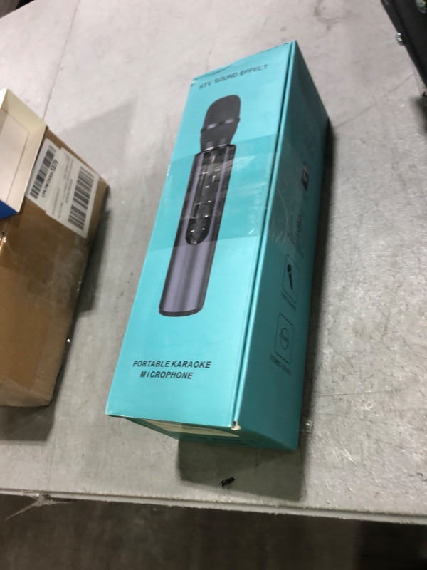 Photo 1 of PANDAAR Wireless Karaoke Bluetooth Microphone, Portable Handheld Microphone with with Speaker, Built-in Sound Card Wireless Voice Amplifier for Home Parties,Travel,Music Recording(Black)