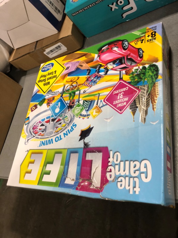 Photo 1 of Hasbro Gaming The Game of Life Board Game, Family Games for Kids Ages 8+, Includes 31 Careers, Family Board Games for 2-4 Players, (Amazon Exclusive)