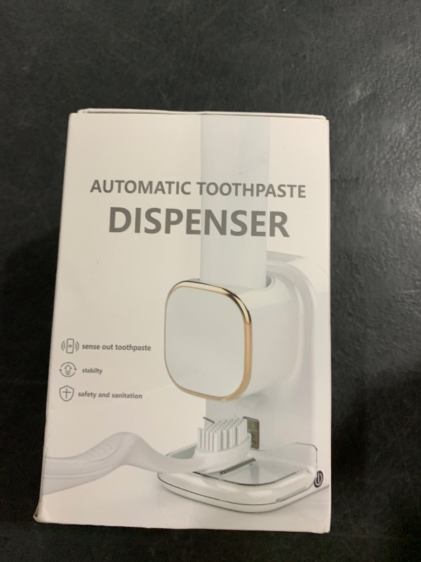 Photo 1 of Toothpaste Dispenser, USB Powered Wall Mount Adjustable Automatic Toothpaste Dispenser Electric Toothpaste Dispenser with Responsive Sensor for Bathroom (White)