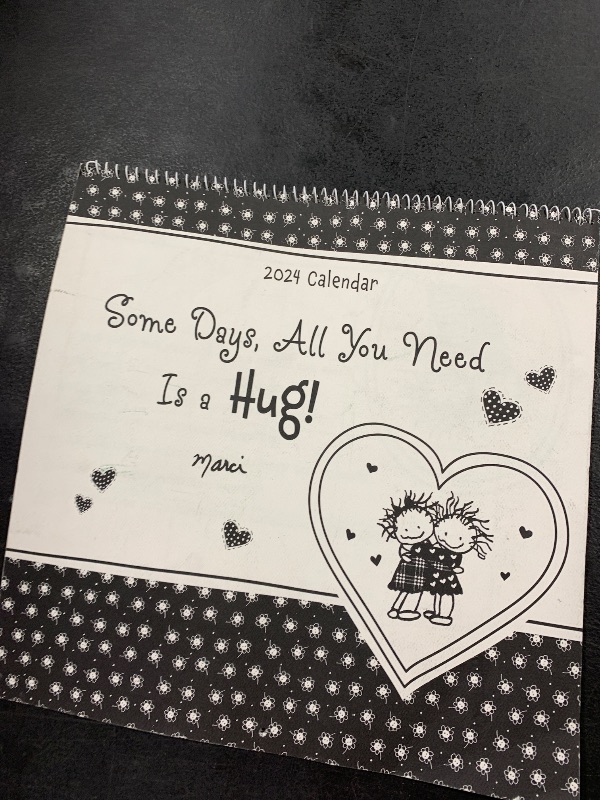 Photo 1 of 2024 Hanging Wall Calendar (Some Days. All You Need Is a Hug!) 12 x 12 in. 12-Month Calendar by Marci & the Children of the Inner Light—from Blue Mountain Arts