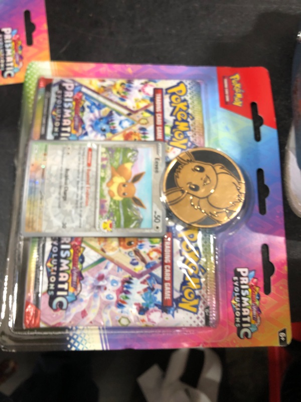 Photo 1 of POKEMON TCG: SCARLET AND VIOLET: PRISMATIC EVOLUTIONS TWO-BOOSTER BLISTER