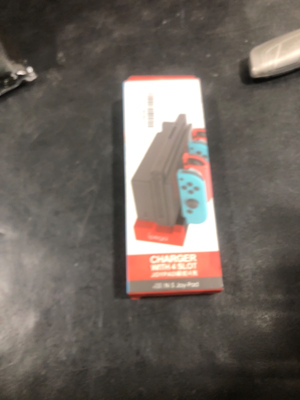 Photo 1 of FastSnail Charger Compatible with Nintendo Switch for Joy con, Charging Dock Stand Station Base and Game Card Storage Holder with 28 Game Card Slots Compatible with Nintendo Switch