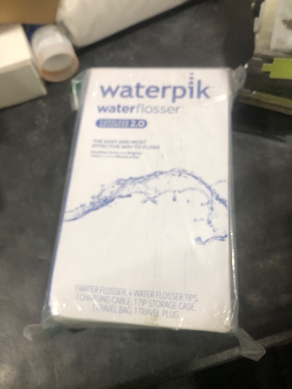 Photo 1 of Waterpik Cordless Advanced 2.0 Water Flosser For Teeth, Gums, Braces, Dental Care With Travel Bag and 4 Tips, ADA Accepted, Rechargeable, Portable, and Waterproof, Blue WP-583, Packaging May Vary
