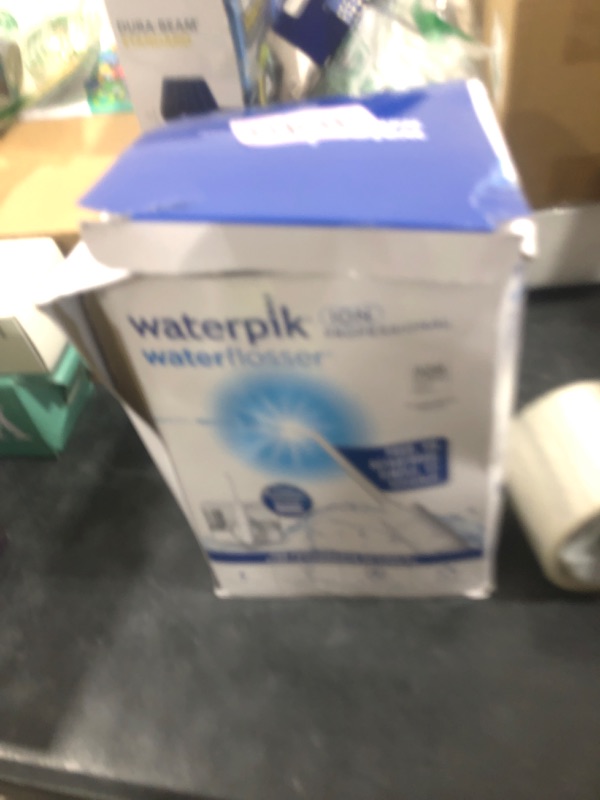 Photo 1 of Waterpik ION Professional Water Flosser, Rechargeable and Portable for Teeth, Gums, Braces, 10 Settings, 7 Flossing Tips For Multiple Users And Needs, ADA Accepted, WF-12 White, Packaging May Vary