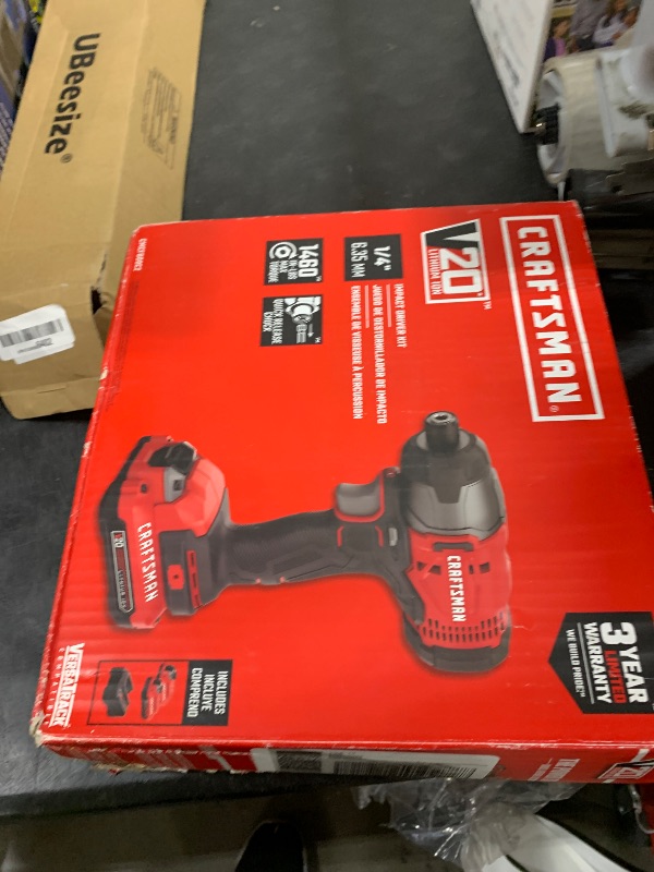 Photo 1 of CRAFTSMAN V20 Cordless Impact Driver Kit, 1/4 inch, 2 Batteries and Charger Included (CMCF800C2)