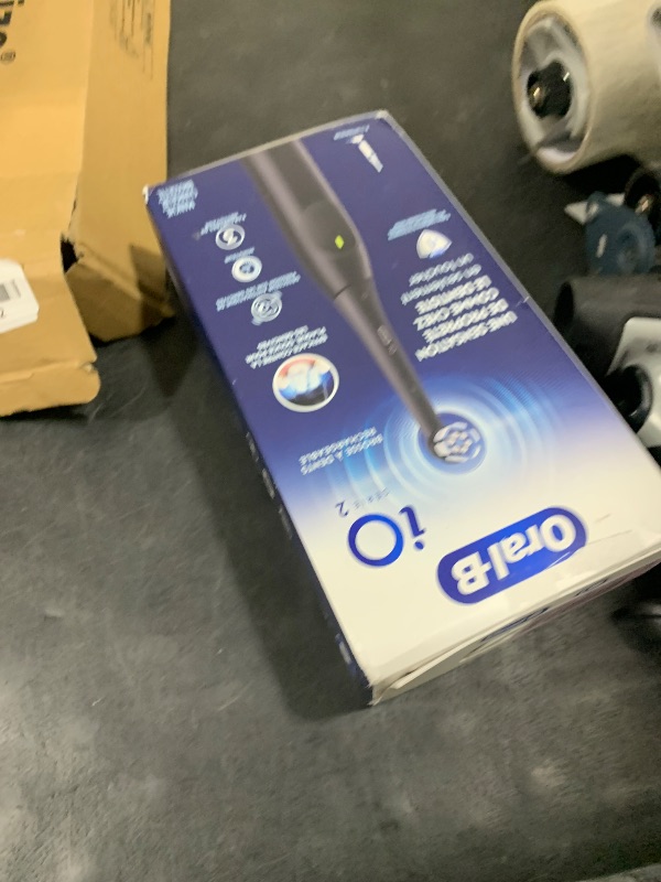 Photo 1 of Oral-B iO Series 2 Rechargeable Electric Powered Toothbrush, Night Black with 1 Gentle Care Brush Head - Automatic Pressure Sensor to Protect Gums - 3 Modes - 2 Min Timer