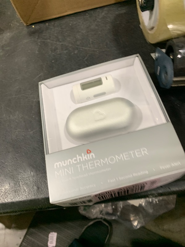 Photo 1 of Munchkin® Forehead Baby Thermometer for Newborns, Kids and Adults, No Touch, Infrared, Fast 1 Second Digital Reading, Travel Case, White