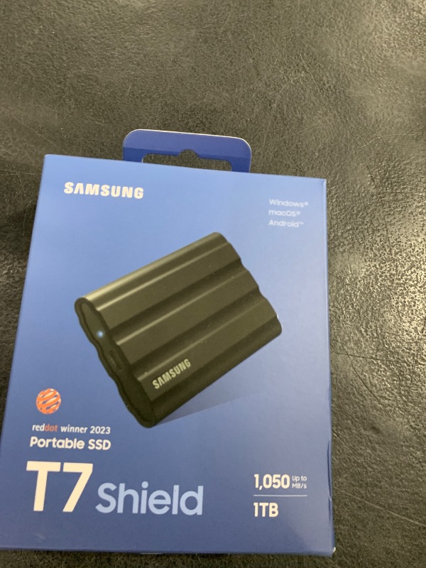 Photo 1 of SAMSUNG T7 Shield 1TB, up to 1050MB/s, USB 3.2 Gen2, Rugged, IP65 Rated, for Photographers, Content Creators and Gaming, Portable External Solid State Drive (MU-PE1T0S/AM, 2022), Black