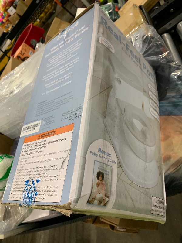 Photo 1 of Real Feel 2-in-1 Potty with Wipes Storage, Flushing Sounds & Disposable Liners - Realistic Toilet - Easy to Clean & Assemble - Jool Baby (Gray)