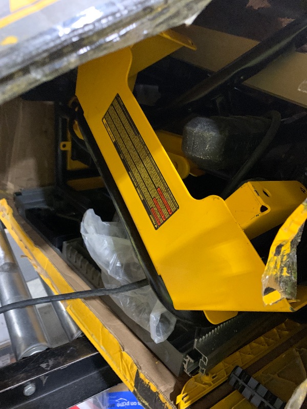 Photo 1 of DEWALT 10-Inch Table Saw with Rolling Stand, 32-1/2-Inch Rip Capacity (DWE7491RS)