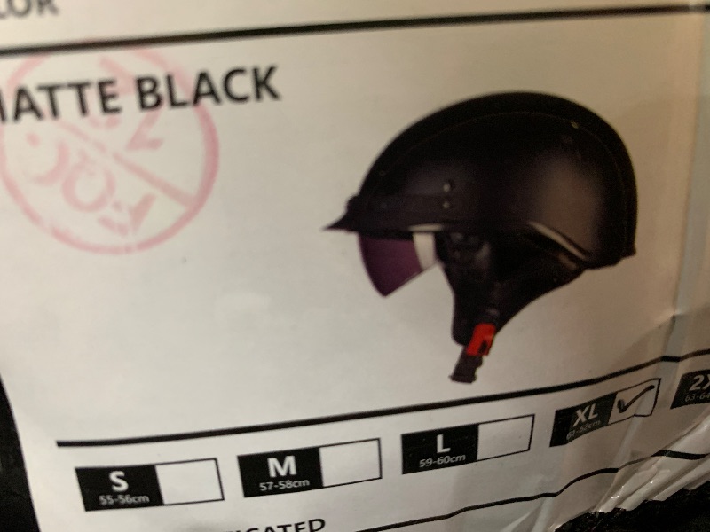 Photo 1 of matte black helmet XL