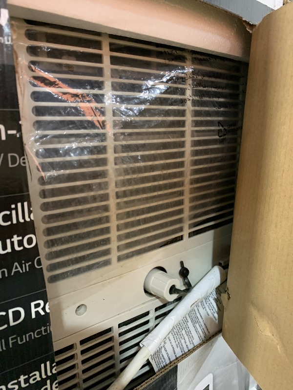 Photo 1 of LG 7,000 BTU Portable Air Conditioner, 115V, Cools 300 Sq.Ft. (12' x 25' Room Size), Portable Air Conditioner for Home with Quiet Operation, LCD Remote Control, and Window Installation Kit, White