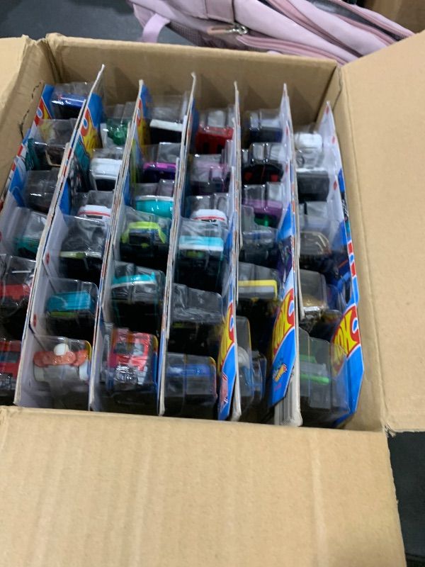Photo 1 of Hot Wheels Toy Cars or Trucks, Set of 72 Individually Packaged 1:64 Scale Cars, Rescue Vehicles or Trucks (Styles May Vary; May Include Duplicates)