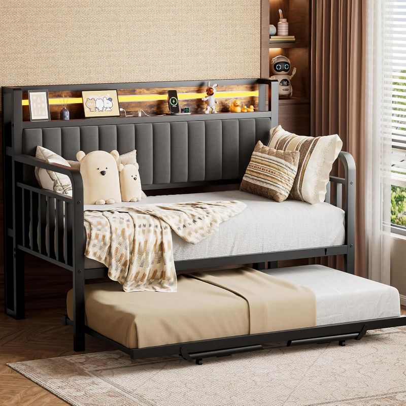 Photo 1 of Daybed with Trundle and LED Light, Heavy Duty Metal Twin Bed Frame with Upholstered Storage Headboard & Charging Station, Day Bed Pop Up Trundle Bed Twin for Living Room,Bedroom and Guest Room (Brown)
