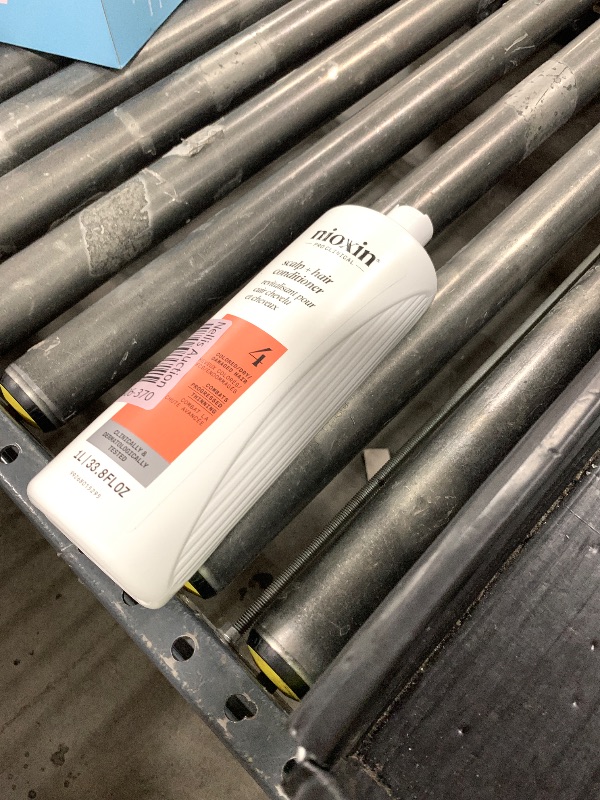 Photo 1 of Nioxin System 4 Scalp + Hair Conditioner | For Colored or Damaged Hair with Progressed Thinning | With Niacinamide and Biotin | 33.8 Fl oz.
