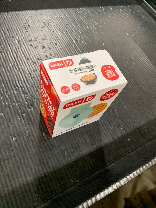Photo 1 of DASH Mini Waffle Maker - 4” Waffle Mold, Nonstick Waffle Iron with Quick Heat-Up, PTFE Nonstick Surface - Perfect Mini Waffle Maker for Kids and Families, Just Add Batter (Aqua)