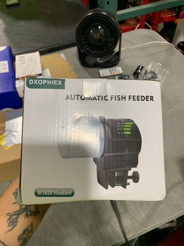 Photo 1 of DXOPHIEX WiFi Fish Feeder Automatic Fish Feeder Automatic Dispenser Vacation for Aquarium and Turtle Tank with Feeding Ring