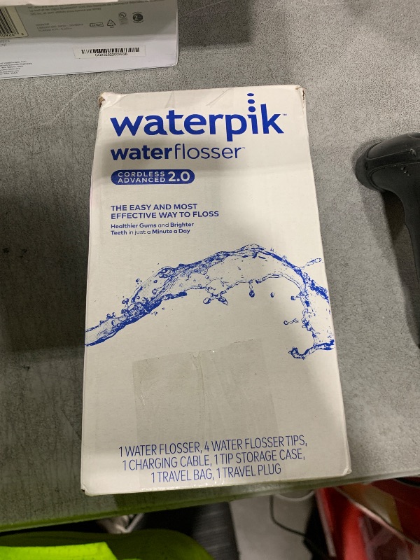 Photo 1 of Waterpik Cordless Advanced 2.0 Water Flosser For Teeth, Gums, Braces, Dental Care With Travel Bag and 4 Tips, ADA Accepted, Rechargeable, Portable, and Waterproof, Gray WP-587, Packaging May Vary