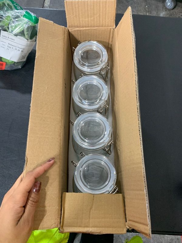 Photo 1 of Tebery 4 Pack Clear Wide Mouth Glass Mason Jars with Airtight Clamp Lids, 32Oz Glass Storage Containers Large Kitchen Canisters for Food, Flour, Pasta, Coffee, Candy, Dog Treats, Snacks & More
