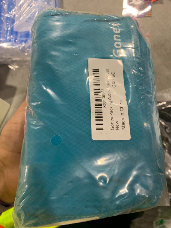 Photo 1 of Gonex Compression Packing Cubes, 4pcs Expandable Storage Travel Luggage Bags Organizers (Blue)
