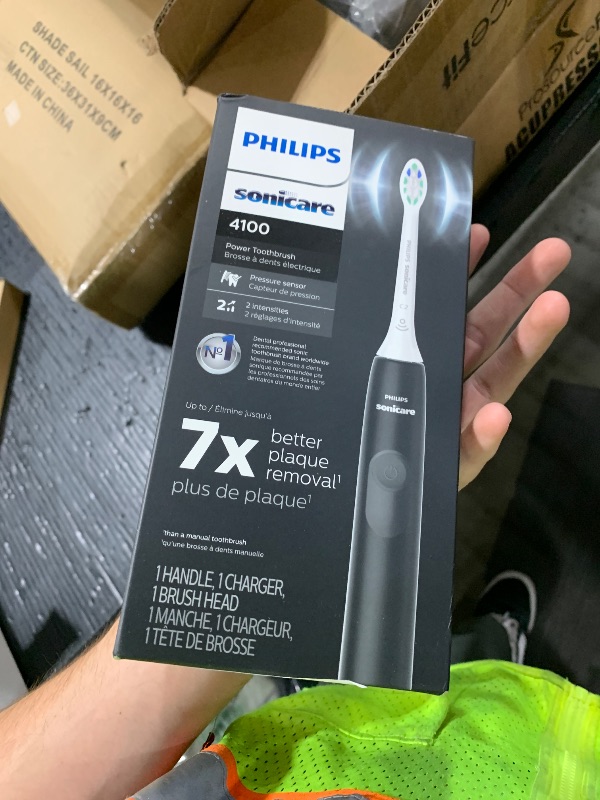 Photo 1 of Philips Sonicare 4100 Rechargeable Electric Toothbrush, with Pressure Sensor, 2 Intensity Settings, SmarTimer and QuadPacer, 14-Day Battery Life, Black, Model HX3681/24