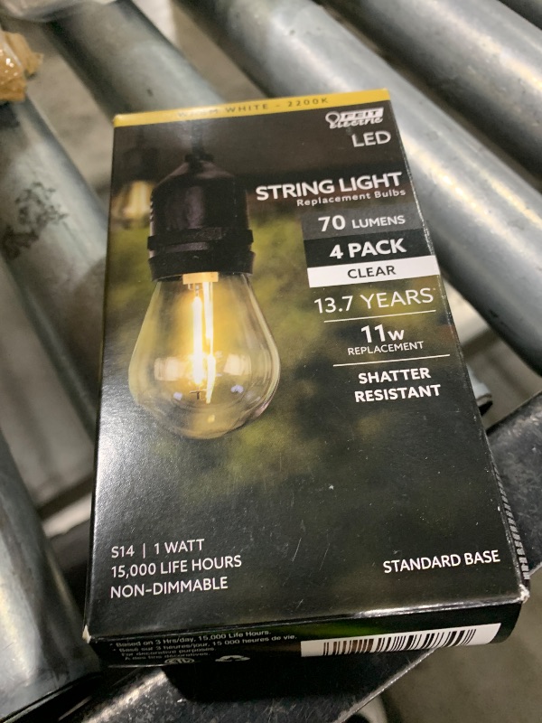 Photo 1 of Feit Electric S14 LED Filament Light Bulbs, High Output, 2200K Warm White, 70 Lumens, String Light Replacement Bulbs, 15,000-Hour Lifespan, Clear Durable Housing, S14/822/FILED/4, 4 Pack