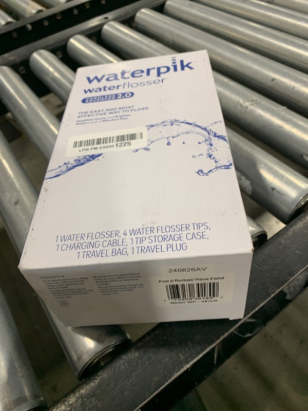 Photo 1 of Waterpik Cordless Advanced 2.0 Water Flosser For Teeth, Gums, Braces, Dental Care With Travel Bag and 4 Tips, ADA Accepted, Rechargeable, Portable, and Waterproof, Gray WP-587, Packaging May Vary