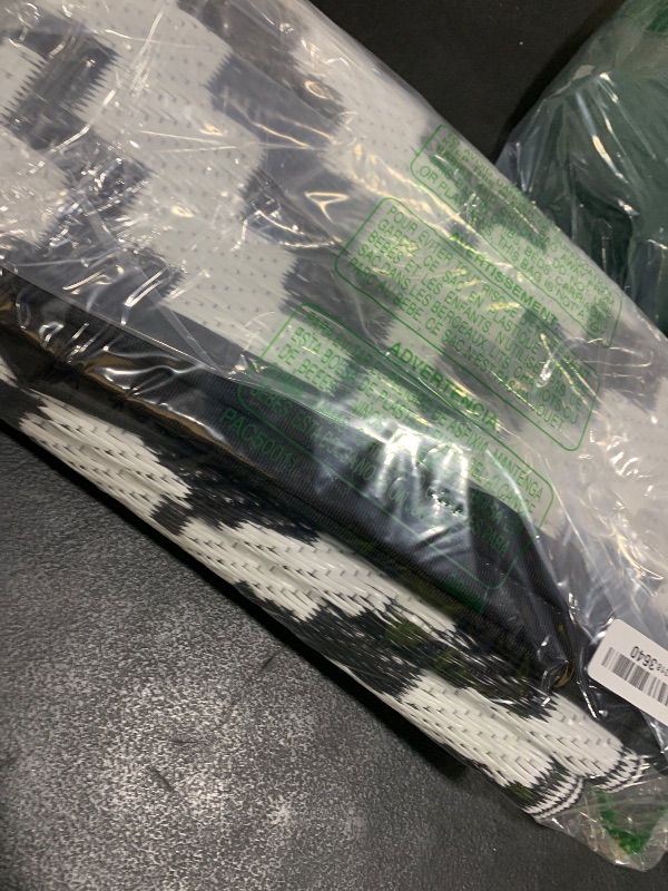 Photo 1 of Favoyard Outdoor Rug 4x6 ft Waterproof Reversible Patio Plastic Straw Rugs for Decor Clearance Outside Large RV Camping Area Carpet Mat for Porch Deck Balcony Pool Backyard Picnic Beach Camper Door