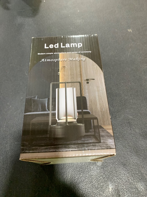 Photo 1 of Portable Metal Table Lamp,Cordless Table Lamp, Rechargeable Battery Operated Lights, LED Table Lamps, 3 Color Stepless Dimming Touch, for Bedroom Restaurant Home Outdoor (Black)