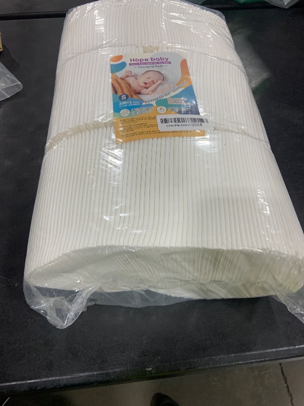 Photo 1 of JUS COOL Baby Disposable Changing Pads, 13”x 18”(200+1 Count) Underpads Portable Diaper Changing Pads, Soft Bed Pads Ultra Absorbent and Waterproof