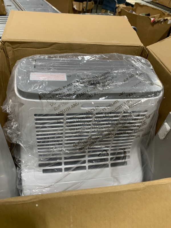 Photo 1 of BLACK+DECKER Portable Air Conditioner, 9,000 BTU (5,300 BTU SACC) for Rooms up to 400 Sq. Ft., Portable AC with Follow Me Remote Control and Window Kit, BPACT08WT, White