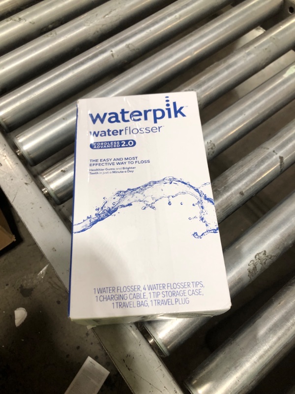 Photo 1 of Waterpik Cordless Advanced 2.0 Water Flosser For Teeth, Gums, Braces, Dental Care With Travel Bag and 4 Tips, ADA Accepted, Rechargeable, Portable, and Waterproof, Gray WP-587, Packaging May Vary