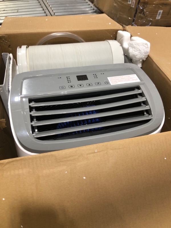 Photo 1 of BLACK+DECKER Portable Air Conditioner, 10,000 BTU (6,300 BTU SACC) for Rooms up to 450 Sq. Ft., Portable AC with Follow Me Remote Control and Window Kit, BPACT10WT, White