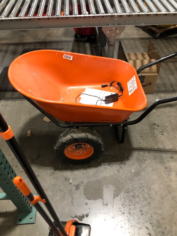 Photo 1 of VEVOR Electric Wheelbarrow Cart, 500W Powered Utility Garden Wagon Dump Cart, 4.5 Cu. Ft. Load & 573 lbs Capacity with Metal Handle & 16" Track Wheels, Two Wheel Barrow Yard Cart & Wagons for Lawn
