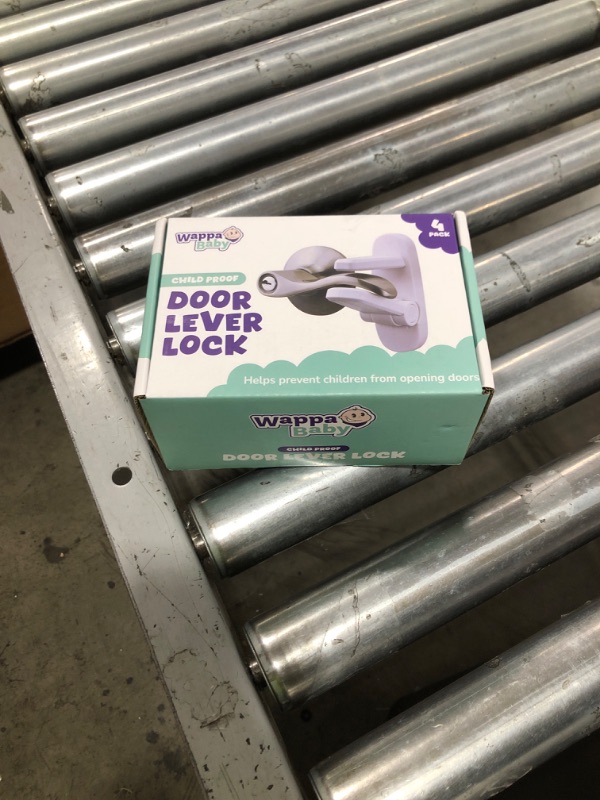 Photo 1 of Door Lever Locks (4 Pack) - Prevents Toddlers from Opening Doors - Durable ABS with 3M Adhesive - Easy One-Hand Operation for Adults, No Tools Needed