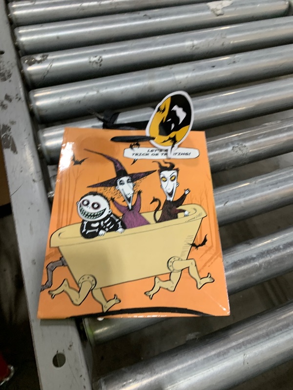 Photo 1 of Amscan Creepy Multicolor Nightmare Before Christmas Medium Gift Bag - 9" x 7" (1 Pc.) - Spooky Design, Ideal for Halloween or Tim Burton Fans