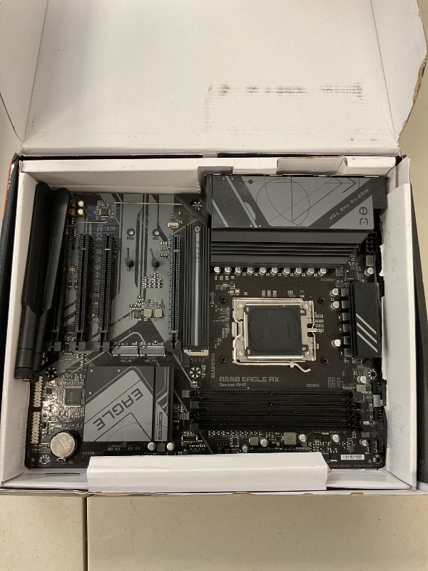 Photo 1 of GIGABYTE B650 Eagle AX AM5 LGA 1718 AMD B650 ATX, DDR5 Triple M.2, PCIe 5.0, USB 3.2 Gen2x2 Type-C, AMD Wi-Fi 6E, Realtek GbE LAN