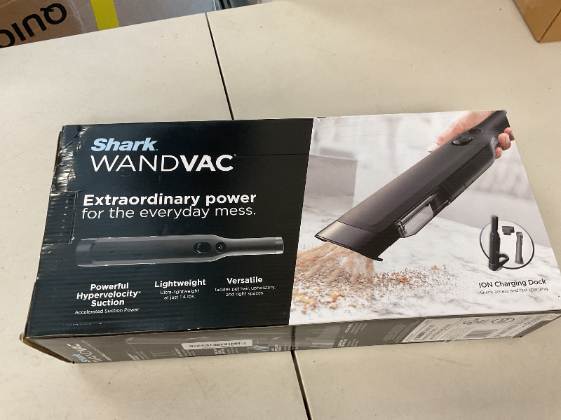 Photo 1 of Shark WANDVAC Cordless Hand Vac, Lightweight, Versatile and Portable at 1.4 lbs., Powerful Suction for Pet Hair, Charging Dock, One-Touch Empty for Car & Home, Duster Crevice Tool, Black, WV201BK
