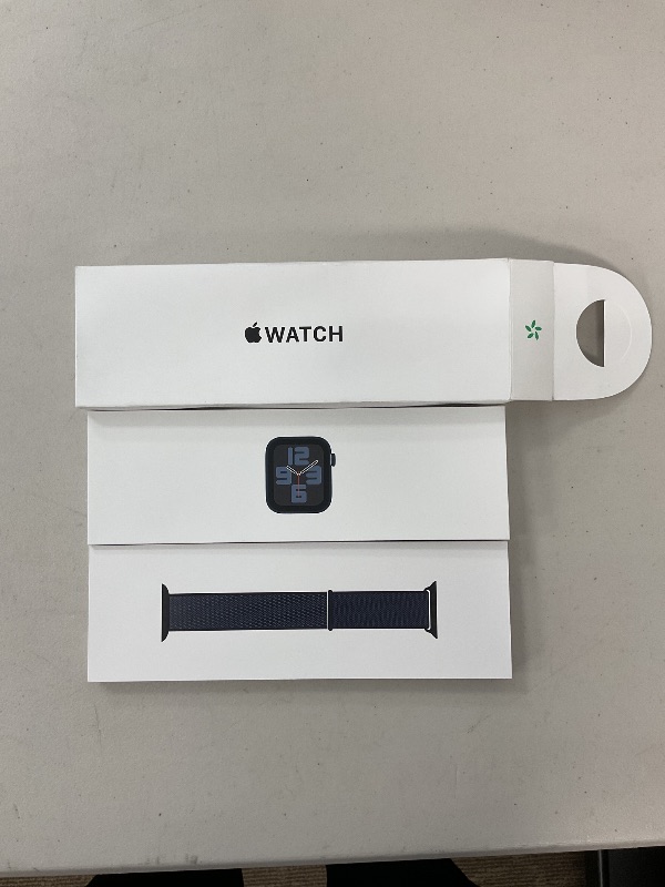 Photo 1 of Apple Watch SE (2nd Gen) [GPS + Cellular 44mm] Smartwatch with Midnight Aluminum Case with Ink Sport Loop One Size. Fitness and Sleep Trackers, Crash Detection, Heart Rate Monitor, Carbon Neutral