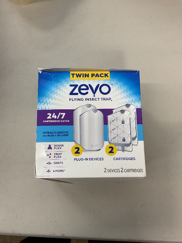 Photo 1 of Zevo 2 Flying Insect Traps & 2 Cartridges - Plug In Fly Trap & Indoor Bug Catcher for Gnats, House & Fruit Flies - Mess-Free - Use in Any Room - Uses Blue & UV Light (2 Plug In Devices & 2 Cartridges)
