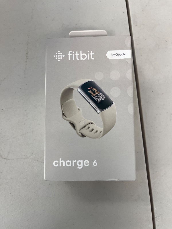 Photo 1 of Fitbit Charge 6 Fitness Tracker with Google apps, Heart Rate on Exercise Equipment, 6-Months Premium Membership Included, GPS, Health Tools and More, Porcelain/Silver, One Size (S & L Bands Included)