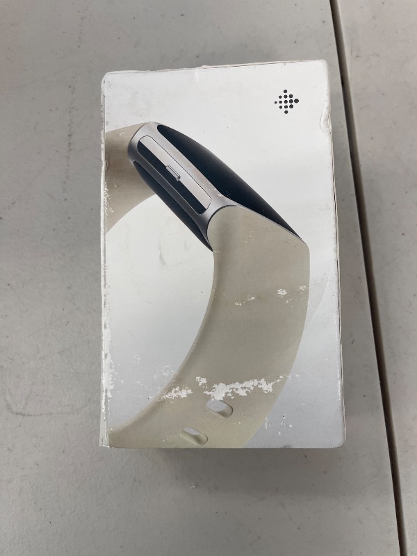 Photo 1 of Fitbit Charge 6 Fitness Tracker with Google apps, Heart Rate on Exercise Equipment, 6-Months Premium Membership Included, GPS, Health Tools and More, Porcelain/Silver, One Size (S & L Bands Included)