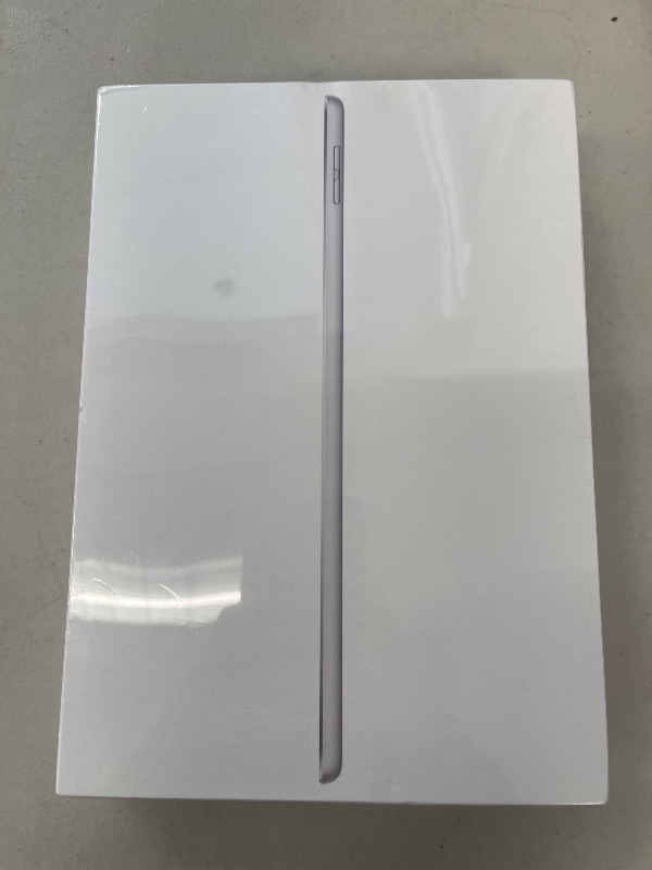 Photo 1 of Apple iPad (9th Generation): with A13 Bionic chip, 10.2-inch Retina Display, 64GB, Wi-Fi, 12MP front/8MP Back Camera, Touch ID, All-Day Battery Life – Silver