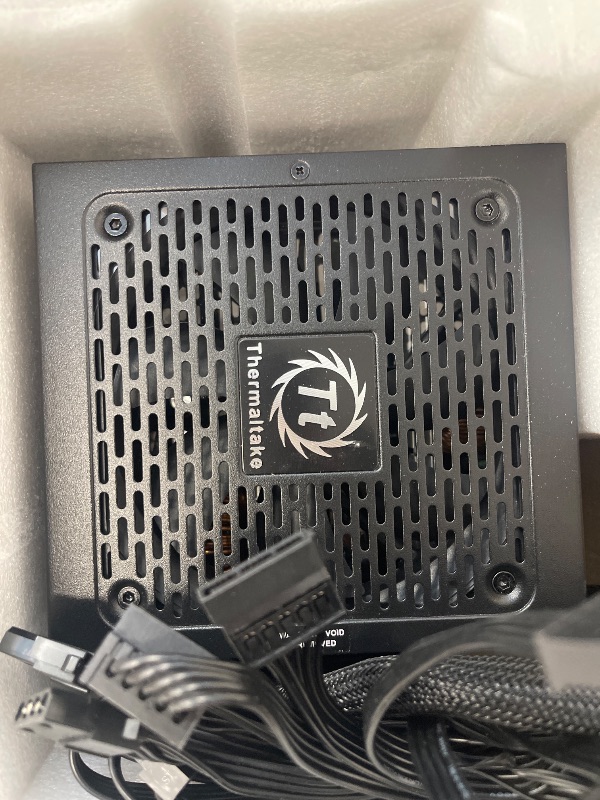 Photo 1 of Thermaltake Smart BX1 750W Bronze SLI/Crossfire Ready Continuous Power ATX12V V2.3/ EPS V2.92 80 Plus Bronze Certified 5 Year Warranty Non Modular Power Supply PS-SPD-0750NNFABU-1