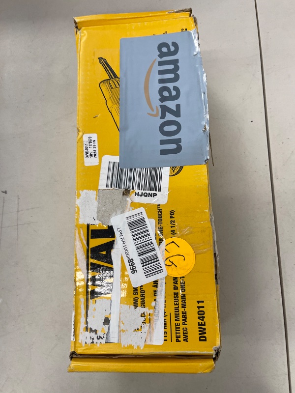 Photo 1 of DEWALT Angle Grinder, One-Touch Guard, 4-1/2 -Inch (DWE4011)