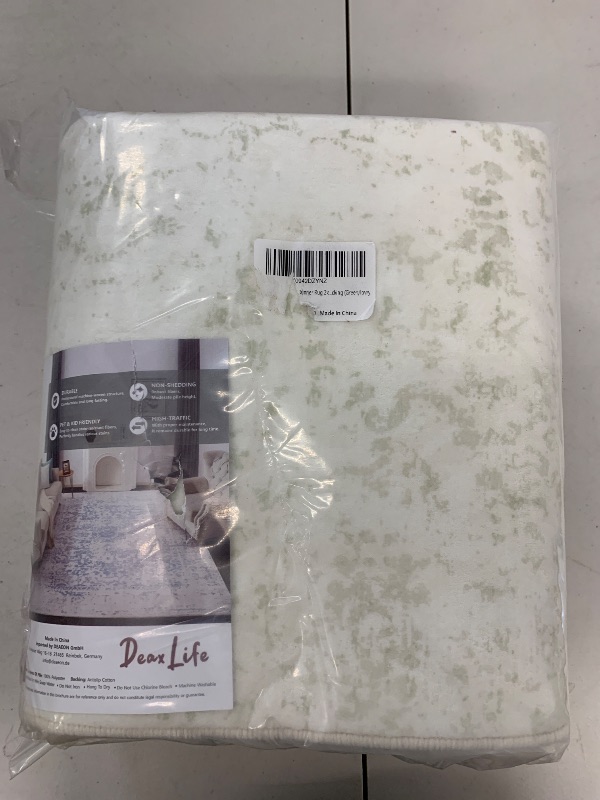 Photo 1 of DEAXLife Washable Area Rug for Living Room - Stain Resistant Urtla Thin Rugs with Non Slip Rubber Backing - Indoor Floor Carpet for Dining Room Home Office Dorm (Green/White, 2x10 Feet)