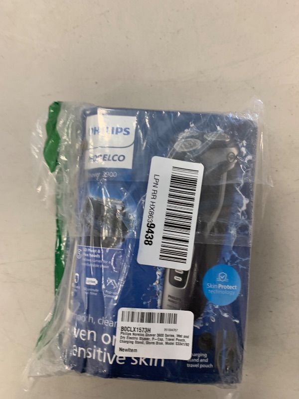 Photo 1 of Philips Norelco Shaver 3900 Series, Wet and Dry Electric Shaver, P-Cap, Travel Pouch, Charging Stand, Storm Blue, Model S3341/92